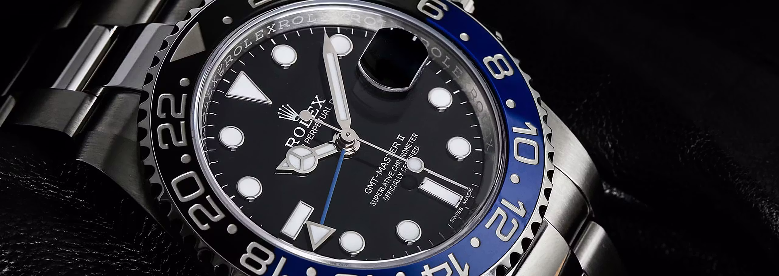 Rolex GMT-Master II Batman with black and blue bezel on Jubilee bracelet, luxury stainless steel sports watch